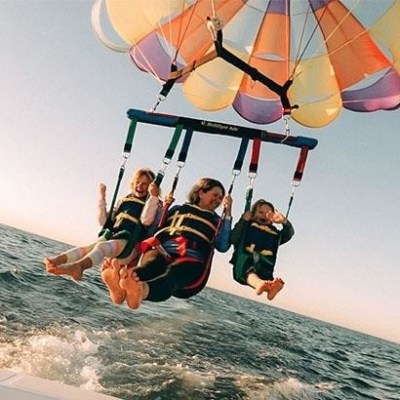 a man riding a wave on a surfboard in the water